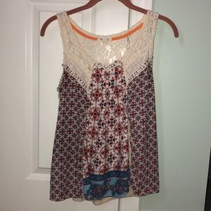 Cute patterned top, plain back with lace
